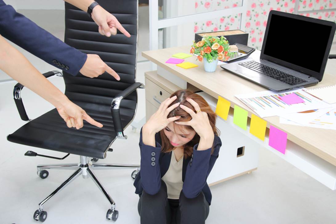 A person sitting on the floor with her hands on her head

AI-generated content may be incorrect.